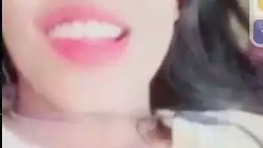 Smiling girlfriend video call to boyfriend shows boobs