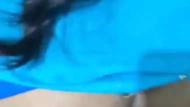 Desi chudai of Bhabhi lying on bed in blue saree