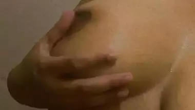 Topless girlfriend showing big boobs and playing