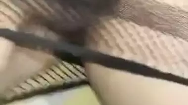 Hot Desi babe in fishnet dress has her pussy XXX rubbed by lover